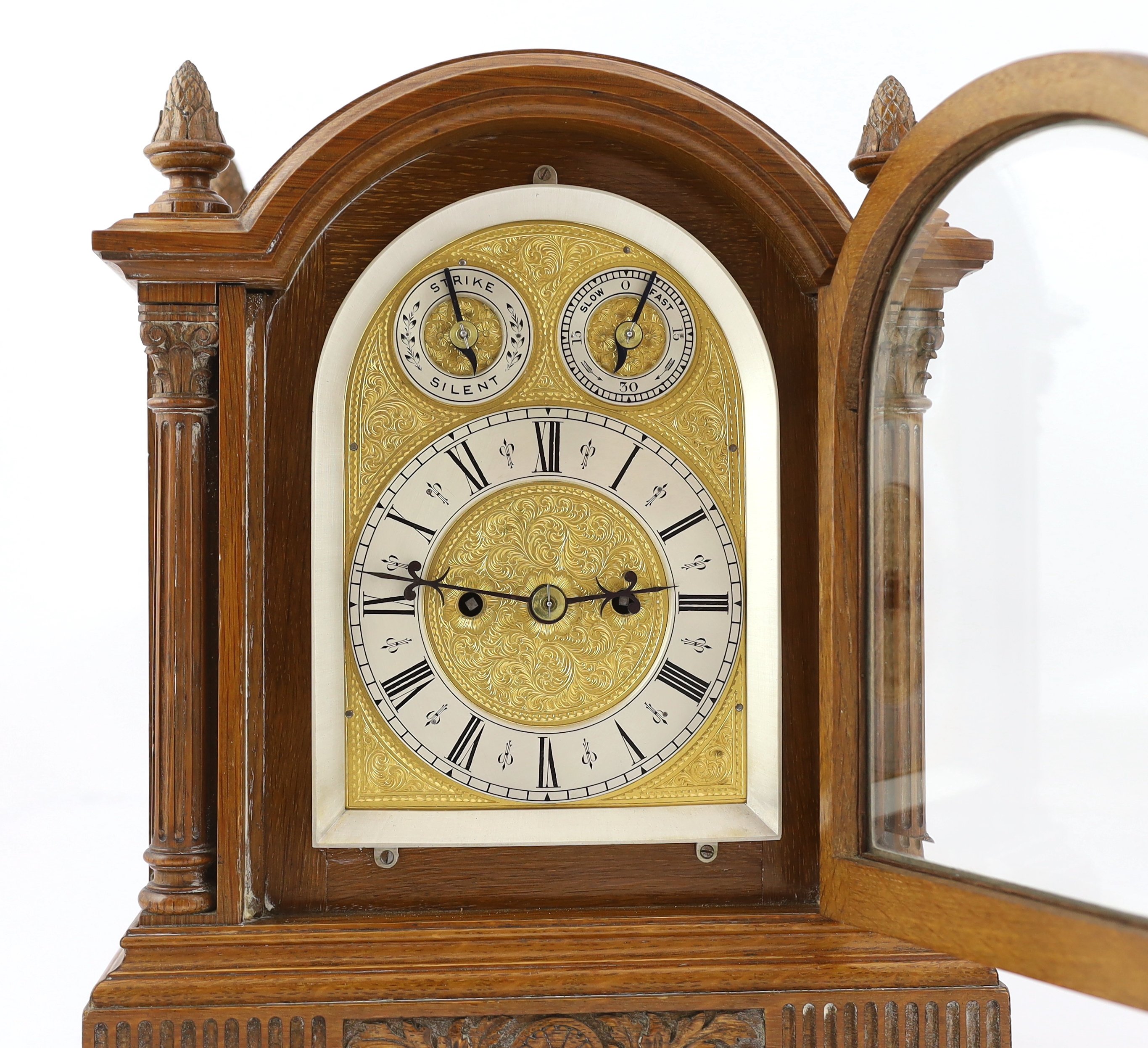 An Edwardian golden oak eight day bracket clock 28cm wide, 19cm deep, 36cm high